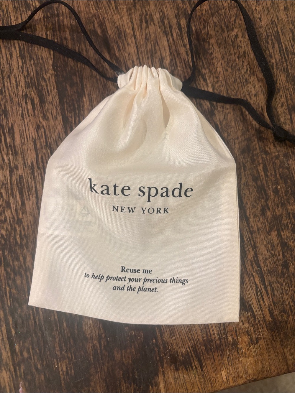 kate spade Cream Drawstring Logo Pouch with Black Cords
